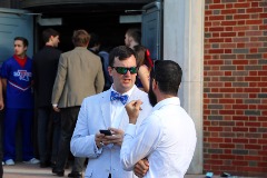 Speaking with track and field coach Jake Cohen prior to an event at Louisiana Tech.